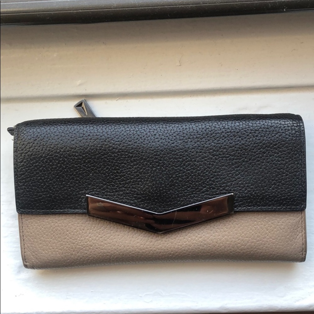 Time’s Arrow Black and Tan Leather Wallet
